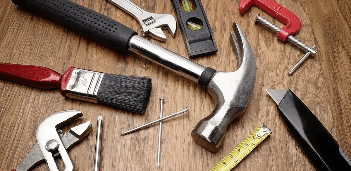 Handyman tools laid out for home repair and maintenance work in Chicago, IL